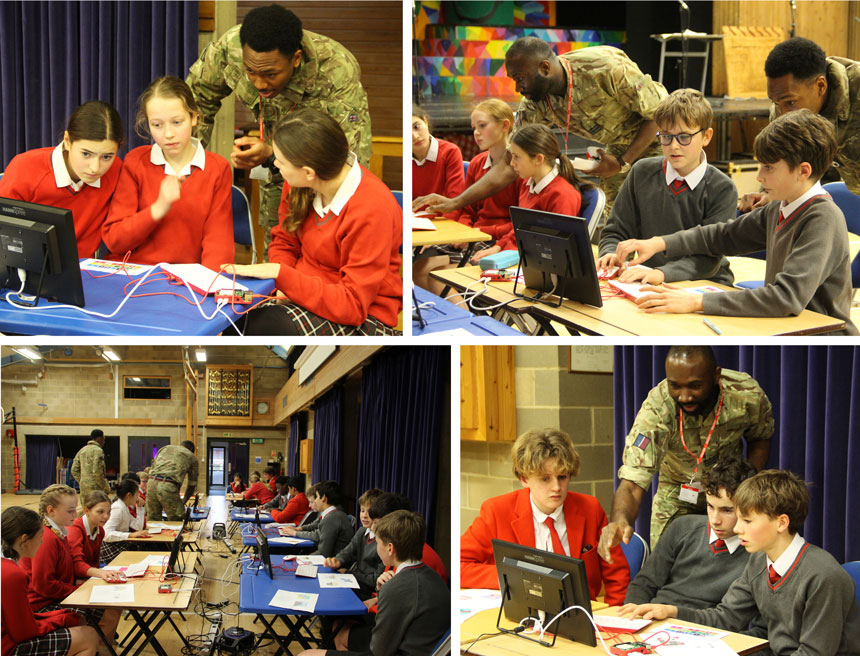 RAF soldiers teaching pupils how to code with python on computers