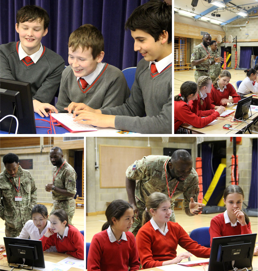 RAF soldiers teaching pupils how to code with python on computers