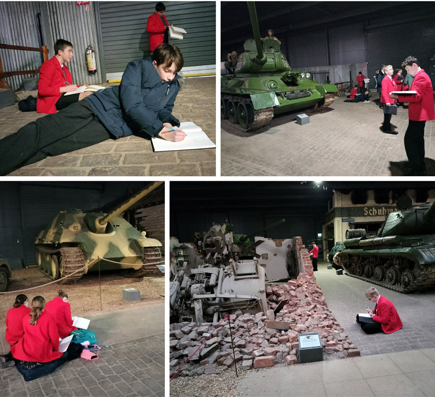 children in war museum looking at wartime artefacts