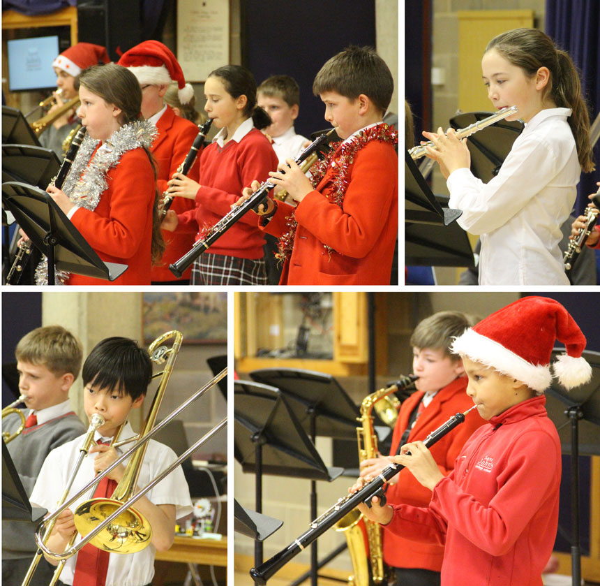 young musicians performing a christmas concert with instruments in a hall