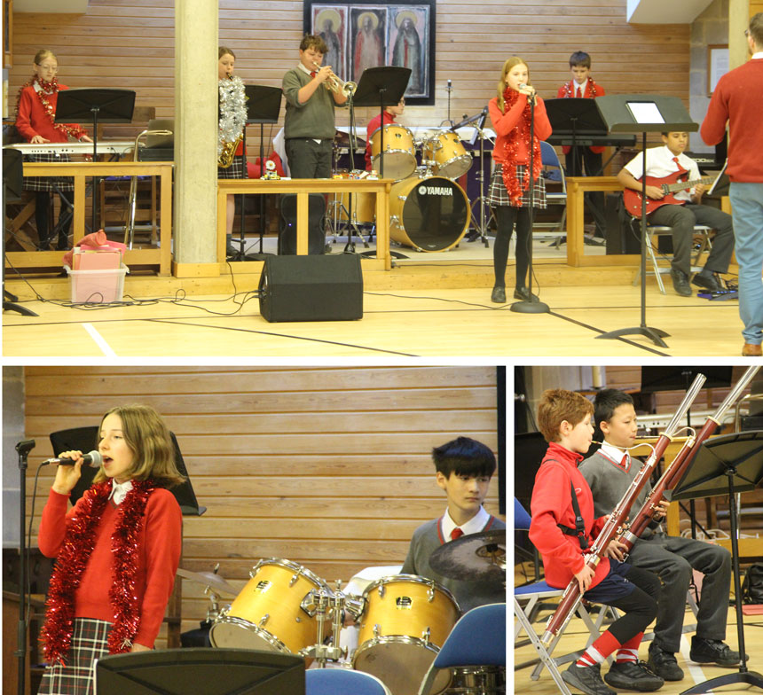 young musicians performing a christmas concert with instruments in a hall