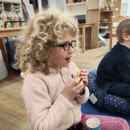 girl eating biscuit