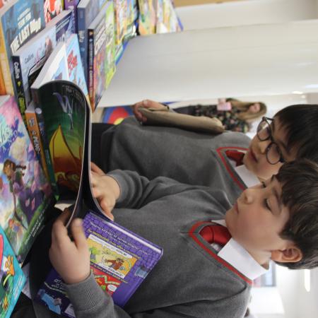 children reading a book