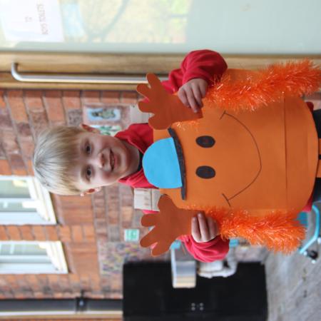 child with mr tickle costume