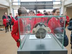 children in an imperial wartime museum looking at artefacts