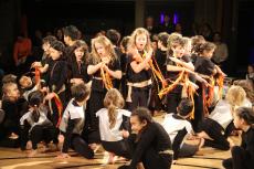 children dressed as Romans acting in a play