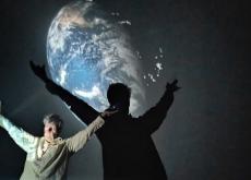 man giving a presentation to children about science in a space dome